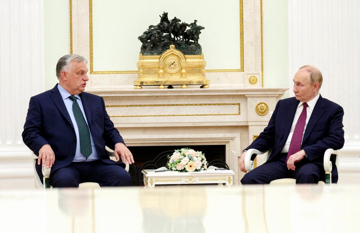 Hungarian Prime Minister Viktor Orban (L) meets with Russian President Vladimir Putin at the Kremlin in Moscow on July 5, 2024. (Valery Sharifulin/AFP via Getty Images)
