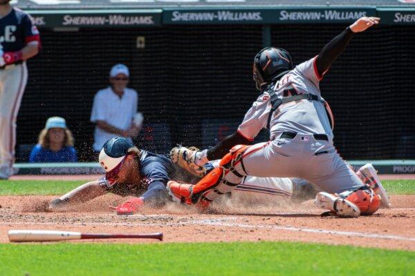 Giants catcher Patrick Bailey puts the tag on Guardians baserunner Josh Naylor in Cleveland on July 7, 2024. (Phil Long/AP Photo)