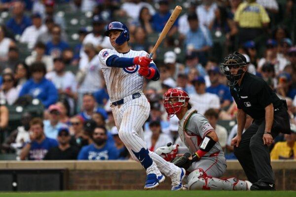 Miguel Amaya (9) of the Chicago Cubs hits a double in the fifth inning against the Los Angeles Angels in Chicago on July 7, 2024. (Jamie Sabau/Getty Images)