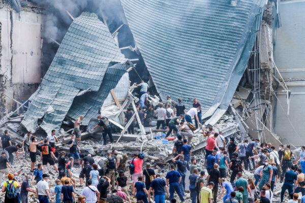 Rescuers work at Ohmatdyt children's hospital, which was allegedly damaged during a Russian missile strike, in Kyiv, Ukraine, on July 8, 2024. (Gleb Garanich/Reuters)