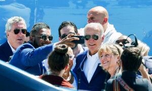 Biden Tells Congressional Democrats Heâs Firmly Committed to Staying in Race