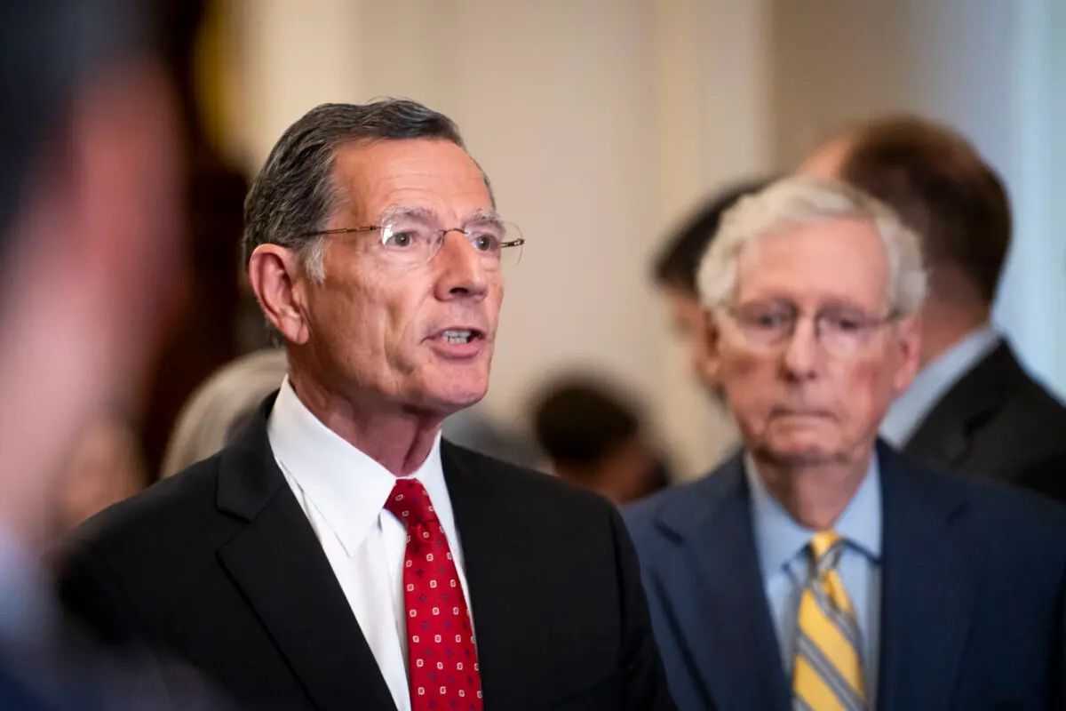 Sen. John Barrasso (R-Wyo.) (L) and Sen. Mitch McConnell (R-Ky.) (R) during the weekly Senate press conference in the U.S. Capitol building in Washington on July 9, 2024. (Madalina Vasiliu/The Epoch Times)