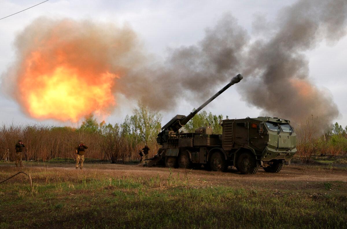 Gunners from the 43rd Separate Mechanized Brigade of the Armed Forces of Ukraine fire at Russian positions with a 155mm self-propelled howitzer in the Kharkiv region on April 21, 2024. (Anatolii Stepanov/AFP via Getty Images)