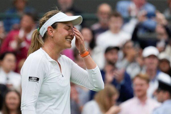 Donna Vekic reacts after defeating Lulu Sun in their Wimbledon quarterfinal match in London on July 9, 2024. (Mosa'ab Elshamy/AP Photo)