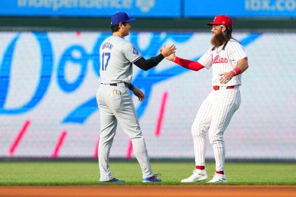Shohei Ohtani (17) of the Los Angeles Dodgers greets Brandon Marsh (16) of the Philadelphia Phillies, former Angels teammates, share greetings prior to the game in Philadelphia on July 9, 2024. (Mitchell Leff/Getty Images)