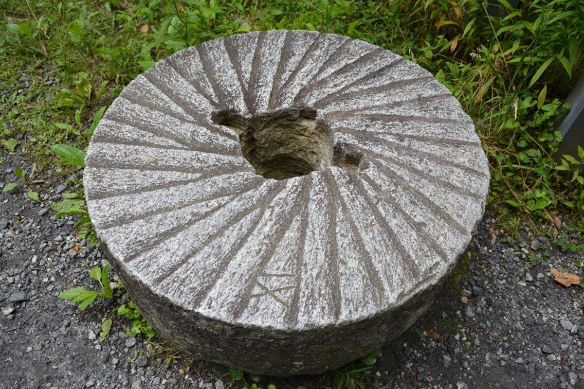 One of the millstones on display, used to grind corn to meal and wheat to flour. (Deena Bouknight)