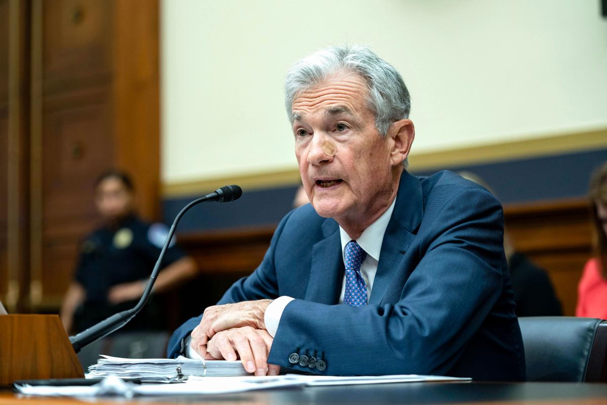 Federal Reserve Could Ease Policy Before Inflation Reaches 2 Percent, Powell Says