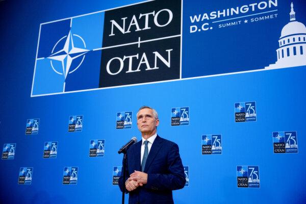 NATO Secretary General Jens Stoltenberg takes a question from a reporter as he arrives at the 2024 NATO summit in Washington on July 10, 2024. (Andrew Harnik/Getty Images)