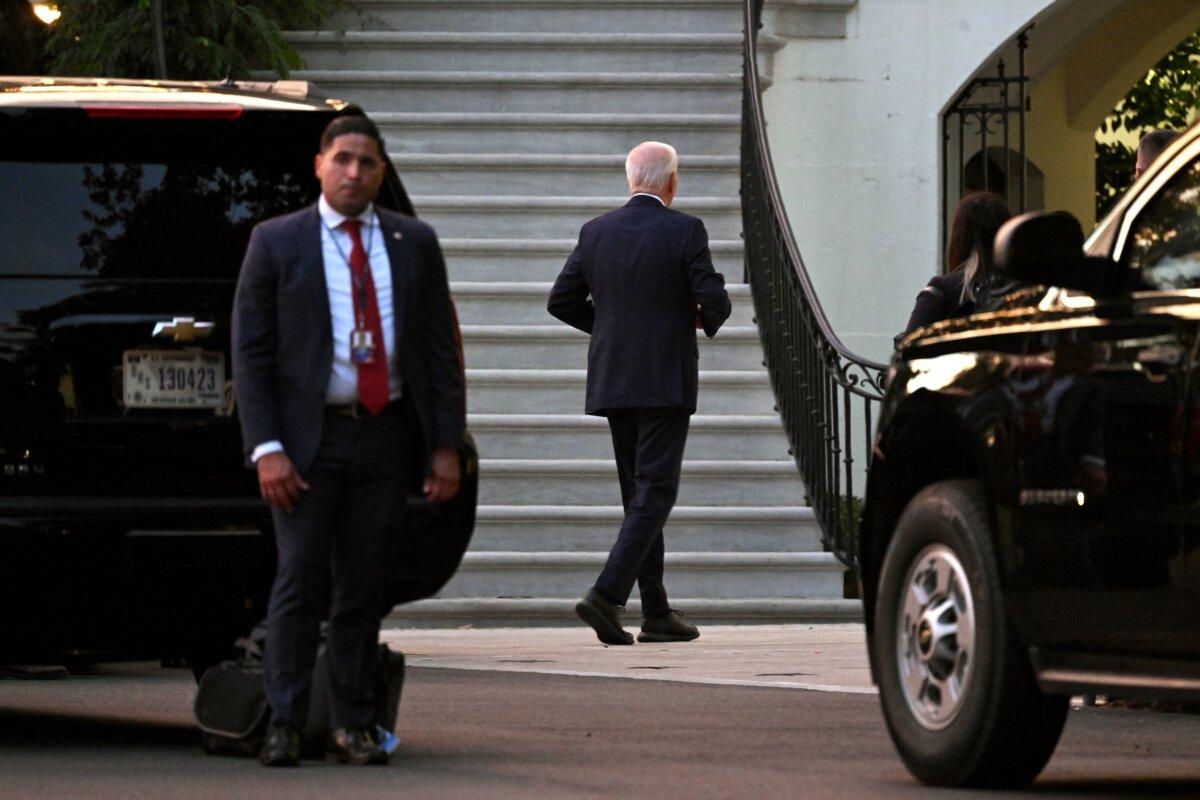 President Joe Biden (C) returns to the White House in Washington, DC on July 11, 2024. (SAUL LOEB/AFP via Getty Images)