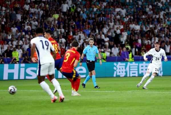 Cole Palmer of England scores his team's first goal during the UEFA EURO 2024 final match between Spain and England in Berlin on July 14, 2024. (Lars Baron/Getty Images)