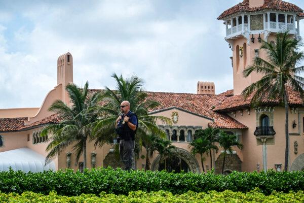 A policeman stands guard at former U.S. president and Republican presidential candidate Donald Trump's Mar-a-Lago resort in West Palm Beach, Fla., on July 14, 2024—a day after Trump survived an attempted assassination. (GIORGIO VIERA/AFP via Getty Images)
