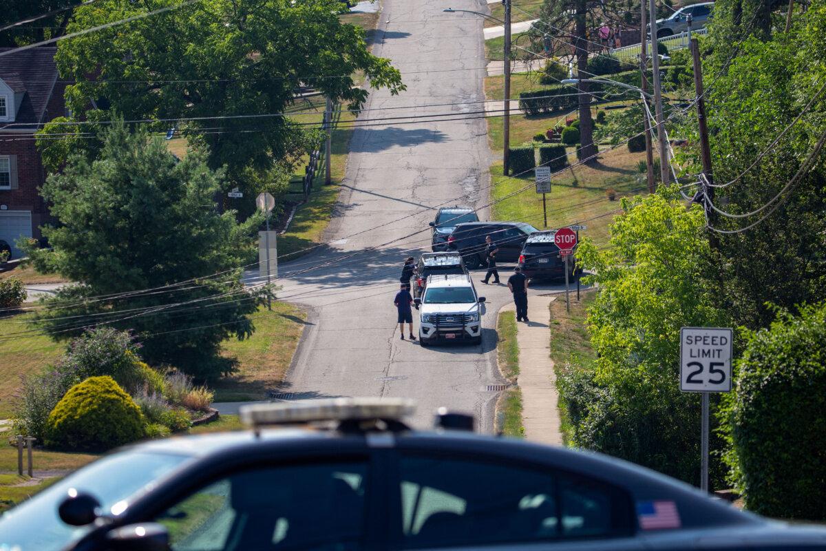 State and local police block off roads surrounding the home of the suspected shooter of former President Donald Trump, as the FBI carries out an investigation, in Bethel Park, Pa., on July 14, 2024. (Rebecca Droke/AFP via Getty Images)<br/>Joseph Lord