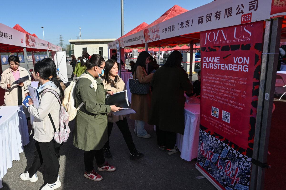 Job seekers attend a job fair in Beijing on March 20, 2024. ( Jade Gao/ AFP via Getty Images)