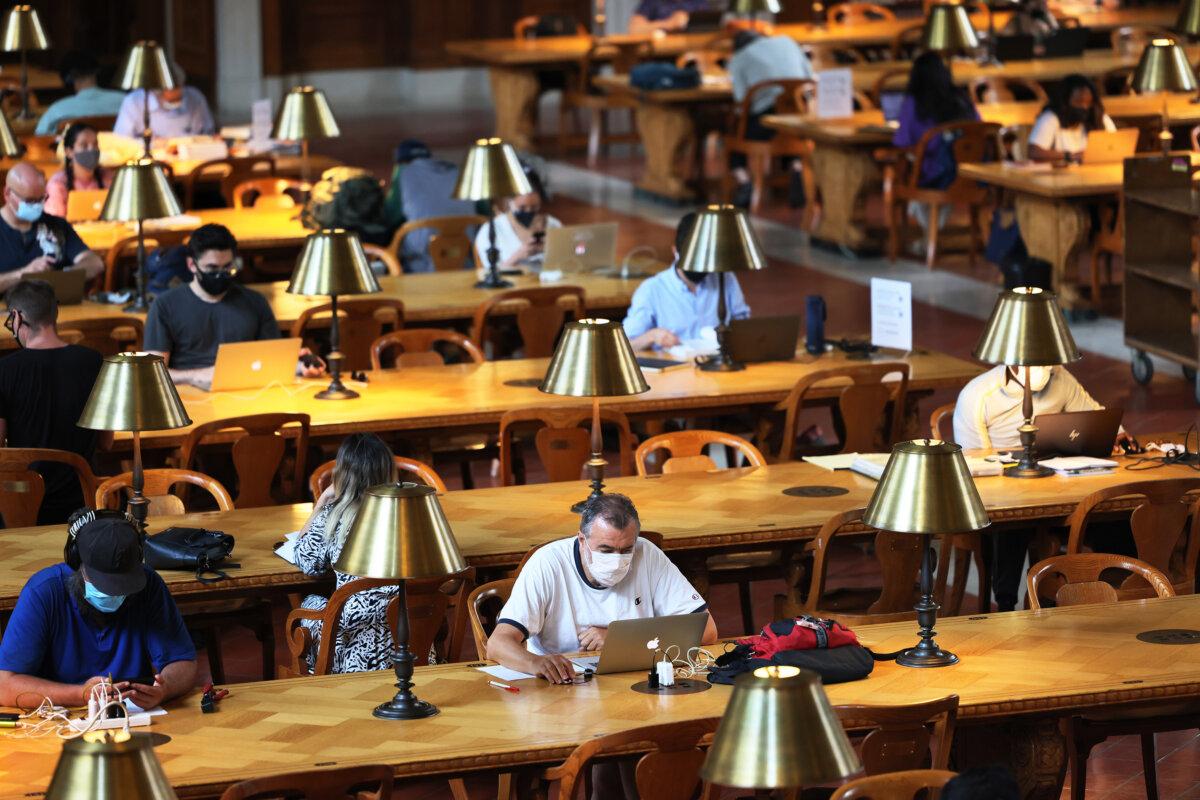 People study in the Rose Main Reading Room of the New York Public Library on July 6, 2021, in Midtown Manhattan. (Michael M. Santiago/Getty Images)