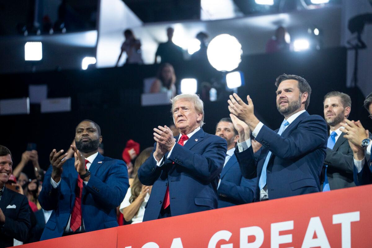 (L-R) Rep. Byron Donalds (R-Fla.), former President Donald J. Trump, and his running mate Sen. J.D. Vance (R-Ohio) attend the 2024 Republican National Convention (RNC) in Milwaukee, Wis., on July 15, 2024. (Madalina Vasiliu/The Epoch Times)