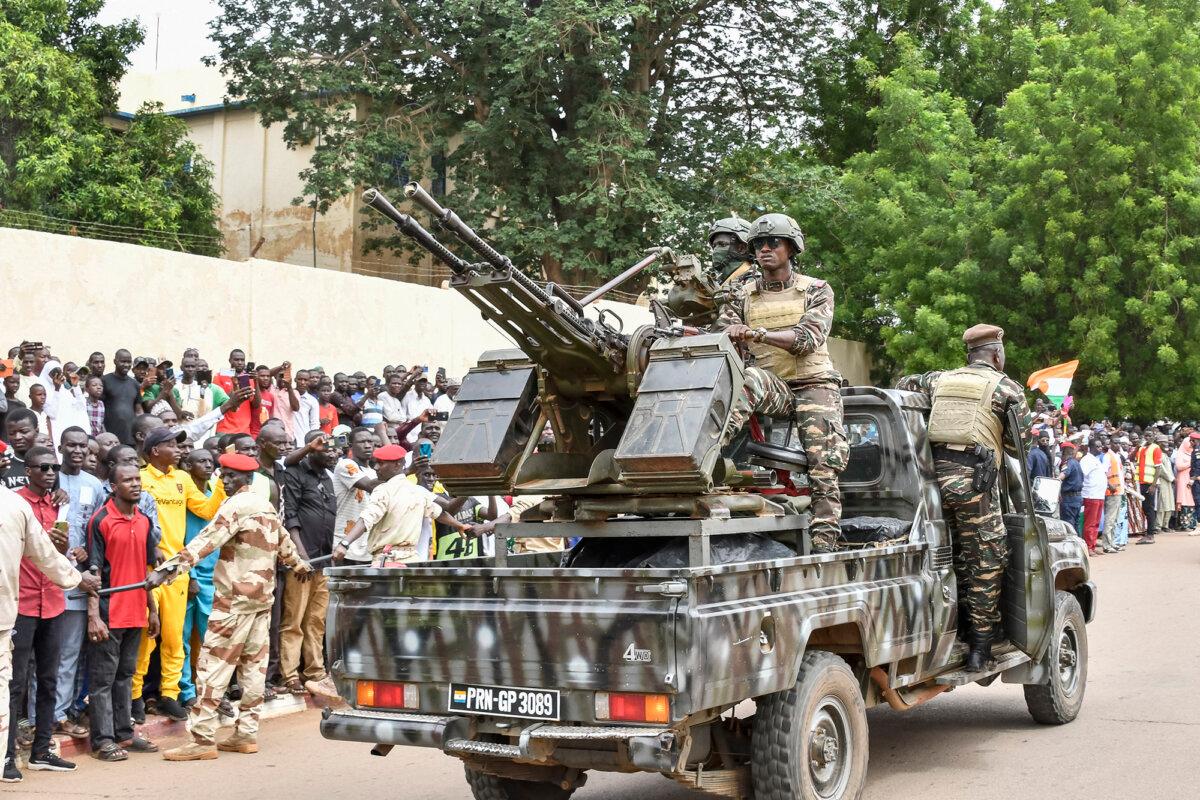 A vehicle of the Presidential Guard of Niger passes in front of the Niamey conference center during a summit of the Confederation of Sahel States on July 6, 2024. (Boureima Hama/AFP via Getty Images)