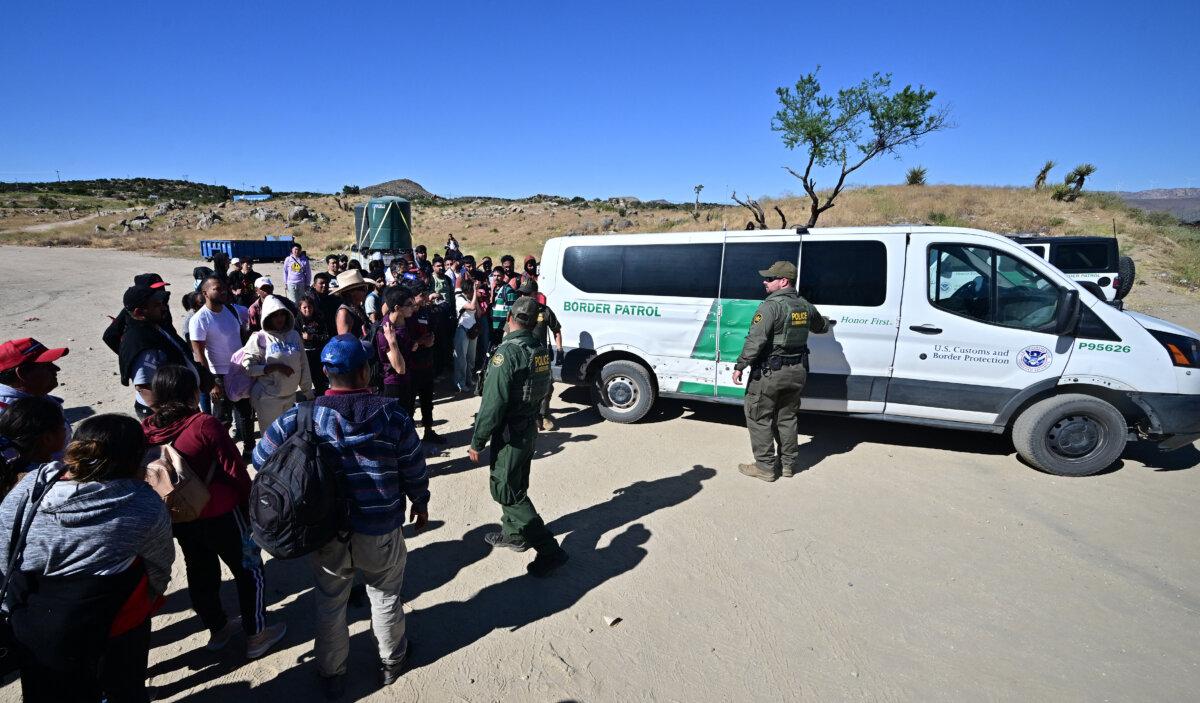 Border Patrol agents arrive with a vehicle after a group of illegal immigrants walked from Mexico into the United States at Jacumba Hot Springs, Calif., on June 5, 2024. (Frederic J. Brown/AFP via Getty Images)