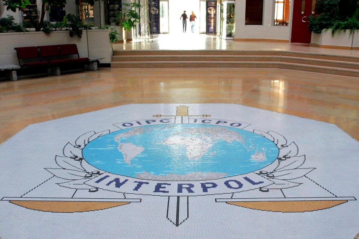 The entrance hall of Interpol's headquarters in Lyon, France, on Sept. 27, 2017. (AP Photo/Laurent Cipriani, File)
