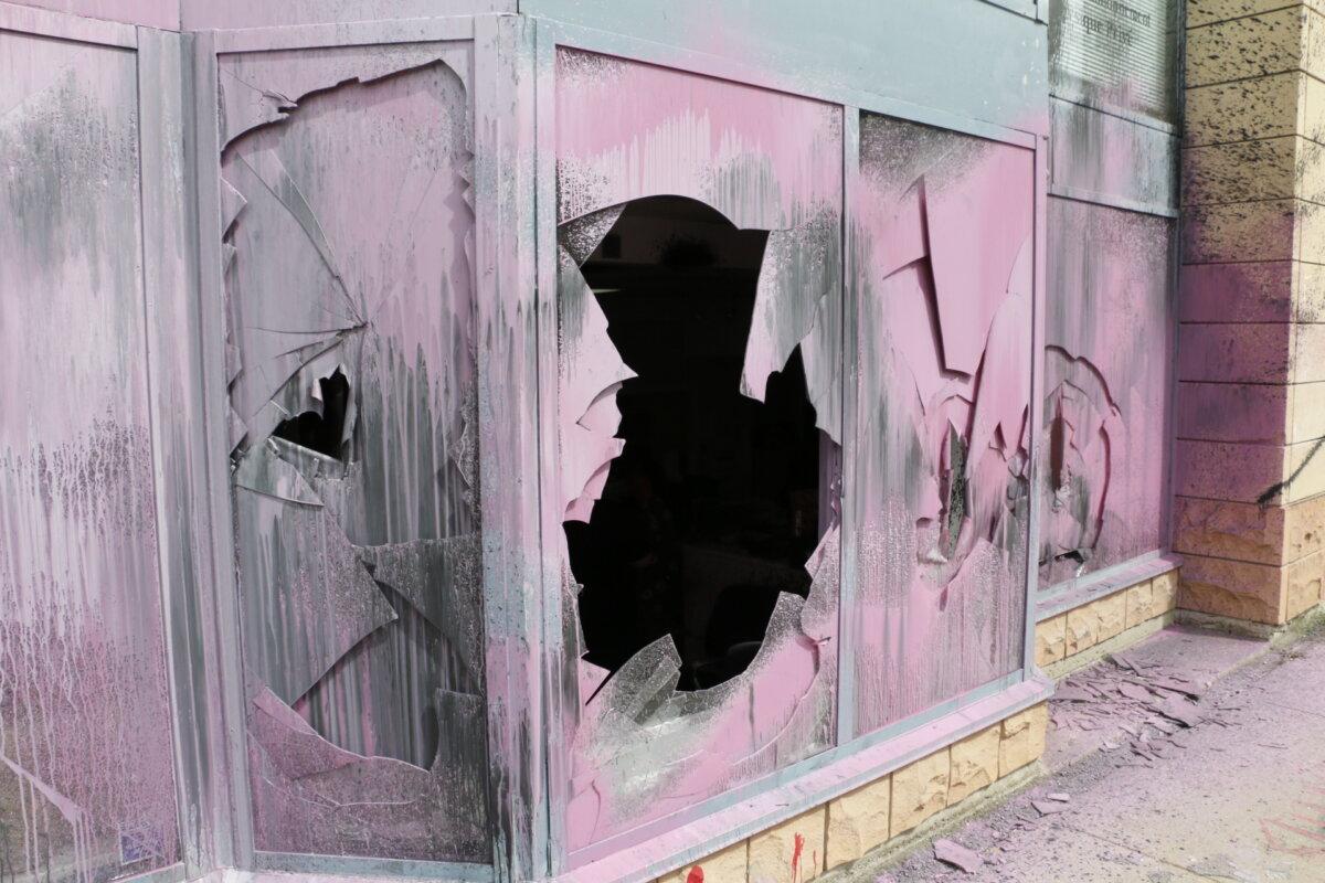 Vandalism damage to the office of Immigration Minister Marc Miller is seen in Montreal on July 18, 2024. (Noé Chartier/The Epoch Times)