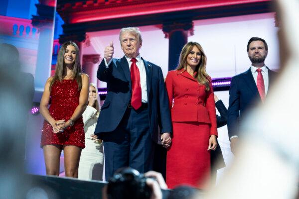(L-R) Kai Madison, daughter of Donald J. Trump Jr., former President Donald J. Trump, former first lady Melania Trump, and Republican vice presidential nominee Sen. JD Vance (R-Ohio), on the stage on the last day of the RNC in Milwaukee, Wis., on July 18, 2024. (Madalina Vasiliu/The Epoch Times)