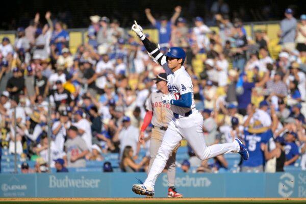 Shohei Ohtani (17) of the Los Angeles Dodgers rounds the bases after hitting a solo home run in the fifth inning against the Boston Red Sox in Los Angeles on July 21, 2024. (Jayne Kamin-Oncea/Getty Images)