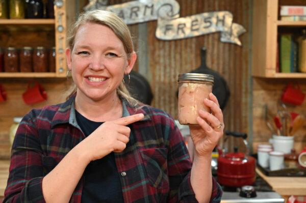 Ms. Thomas cans meat raised on her family's homestead. (Courtesy of Homesteading Family)
