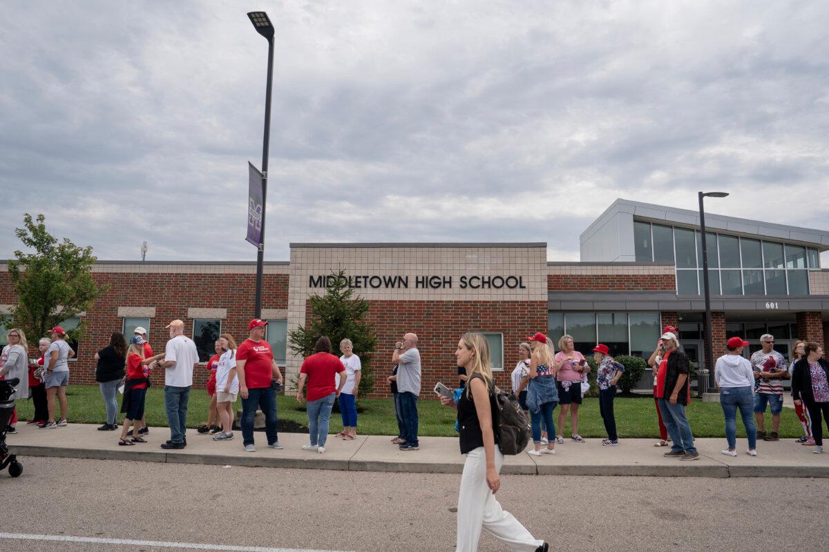 People wait to enter Middletown High School ahead of Republican vice president nominee Sen. JD Vance's (R-Ohio) rally in Middletown, Ohio, on July 22, 2024. (Madalina Vasiliu/The Epoch Times)