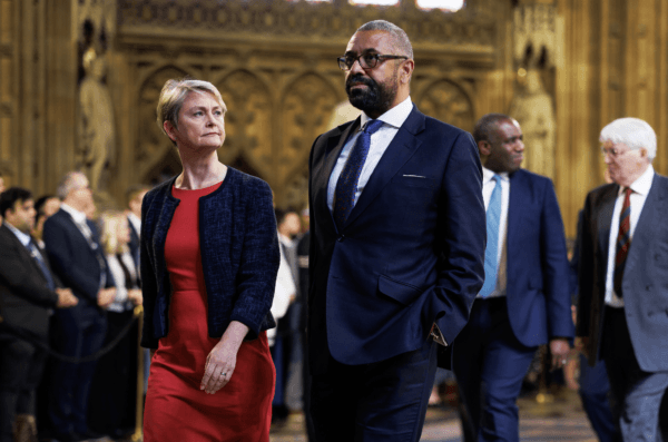 Home Secretary Yvette Cooper and shadow home secretary James Cleverly walk through the Central Lobby of the Houses of Parliament in London to the House of Lords to hear the King's Speech during the State Opening of Parliament, in London on July 17, 2024. (Dan Kitwood/PA Wire)
