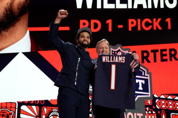 Caleb Williams poses with NFL Commissioner Roger Goodell after being selected first overall by the Chicago Bears during the first round of the 2024 NFL Draft at Campus Martius Park and Hart Plaza in Detroit, Michigan., on April 25, 2024. (Gregory Shamus/Getty Images)