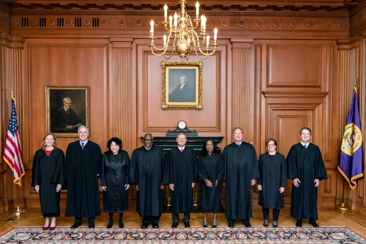 (LâR) Supreme Court Justices Amy Coney Barrett, Neil M. Gorsuch, Sonia Sotomayor, and Clarence Thomas, Chief Justice John G. Roberts, Jr., and Justices Ketanji Brown Jackson, Samuel A. Alito, Jr., Elena Kagan, and Brett M. Kavanaugh in Washington on Sept. 30, 2022. (Collection of the Supreme Court of the United States via Getty Images)
