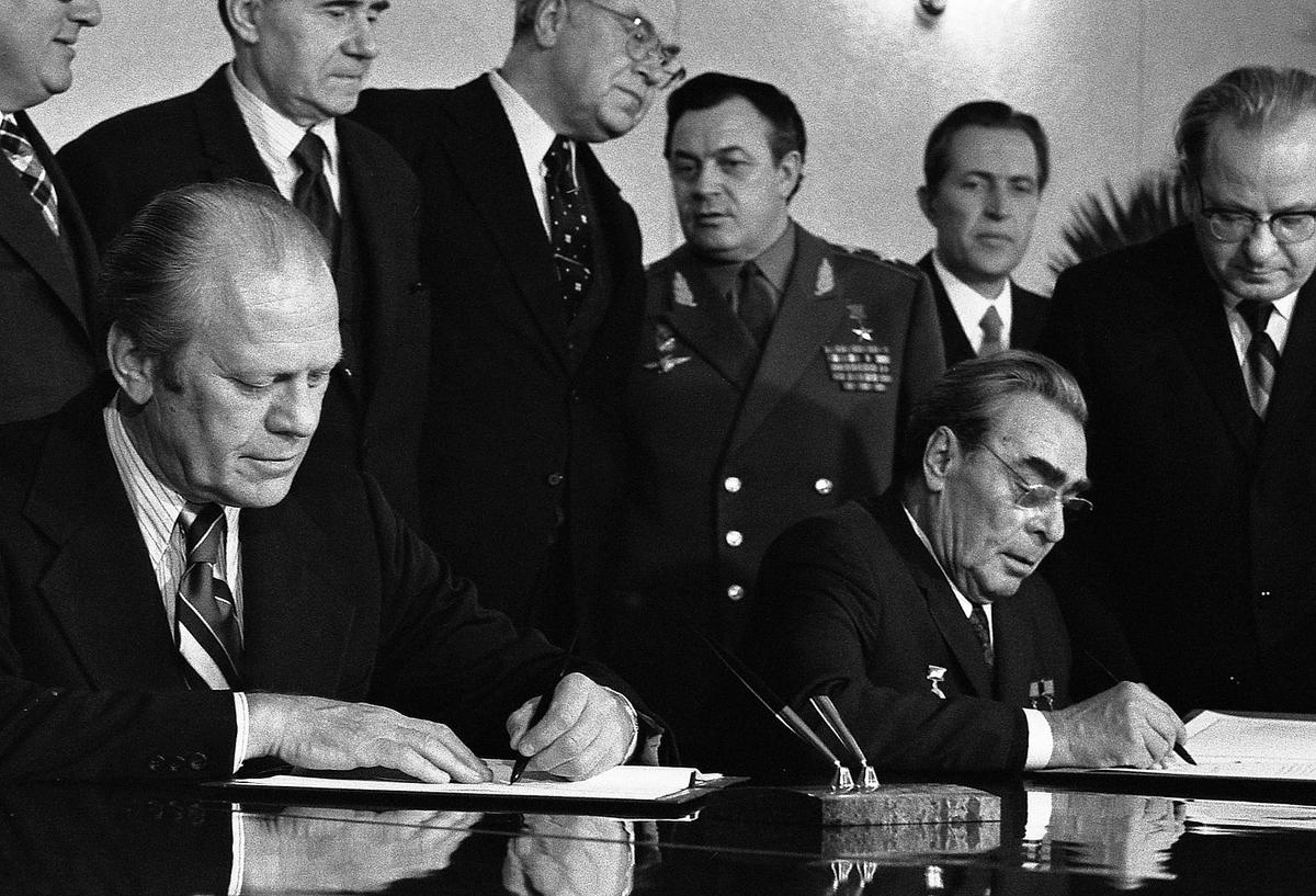 American President Gerald Ford and Soviet General Secretary Leonid Brehznev sign what became known as the Vladivostok Accords, on Nov. 24, 1974. (Public Domain)