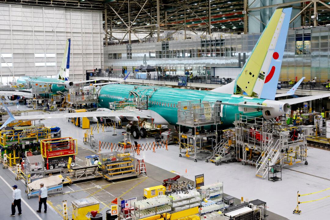 Boeing Reaches Tentative Labor Deal With 25 Percent Pay Hike, New Plane Commitment