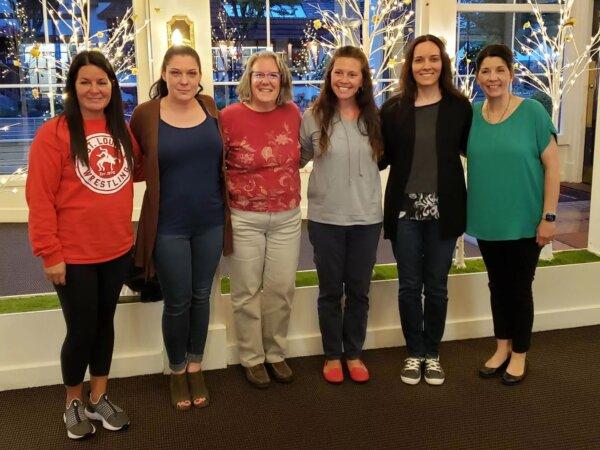 Lynne Spencer (third from left) and five of her 74 DNA-confirmed half-siblings. Courtesy Heather Hundt.
