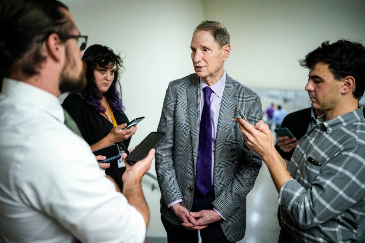 Sen. Ron Wyden (D-Ore.) speaks with reporters at the U.S. Capitol on Sept. 11, 2023. (Drew Angerer/Getty Images)