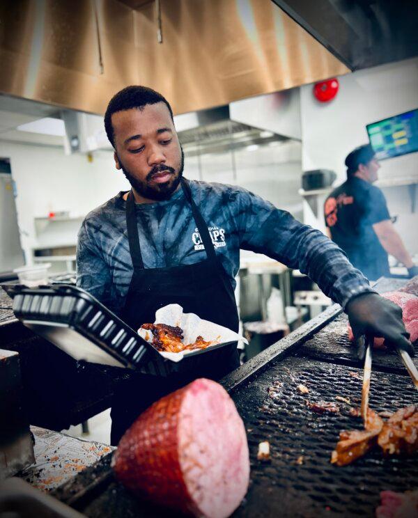 Working the grill at Chaps. (Courtesy of Chaps Pit Beef)