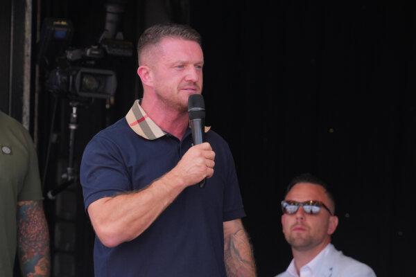 Tommy Robinson addresses the crowd gathered at Trafalgar Square in central London during a protest he organised, on July 27, 2024. (Maja Smiejkowska/PA Wire)