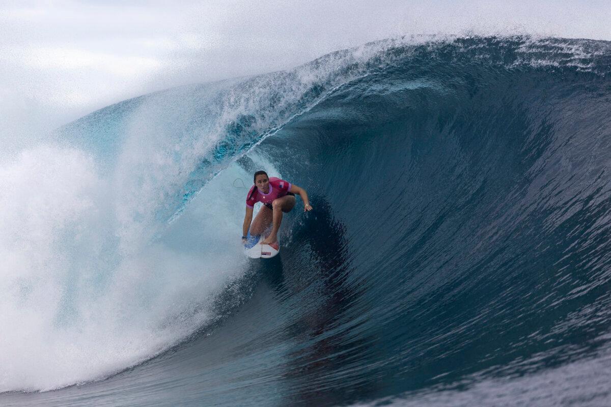 Carissa Moore of Team United States rides a wave during round one of surfing on day one of the Olympic Games Paris 2024 in Teahupo'o, French Polynesia on July 27, 2024. (Ed Sloane/Getty Images)