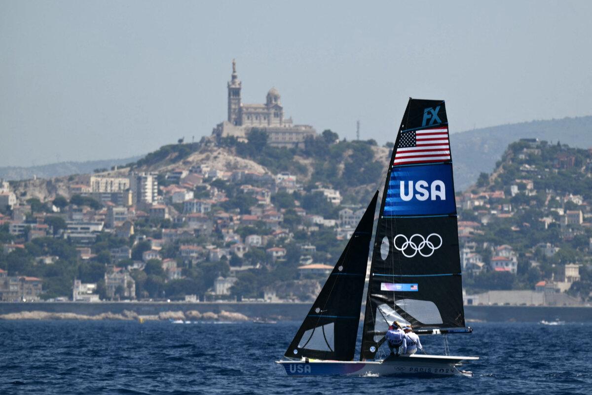 US' Stephanie Roble and US' Maggie Shea compete in Race 1 of the women's 49erFX skiff event during the Paris 2024 Olympic Games sailing competition at the Roucas-Blanc Marina in Marseille on July 28, 2024. (Christophe Simon via Getty Images)