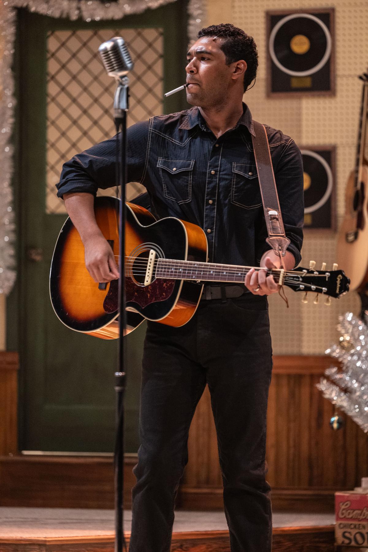 Johnny Cash (Dom Alesia) strums his guitar, in "Million Dollar Quartet." (Jennifer Heim)