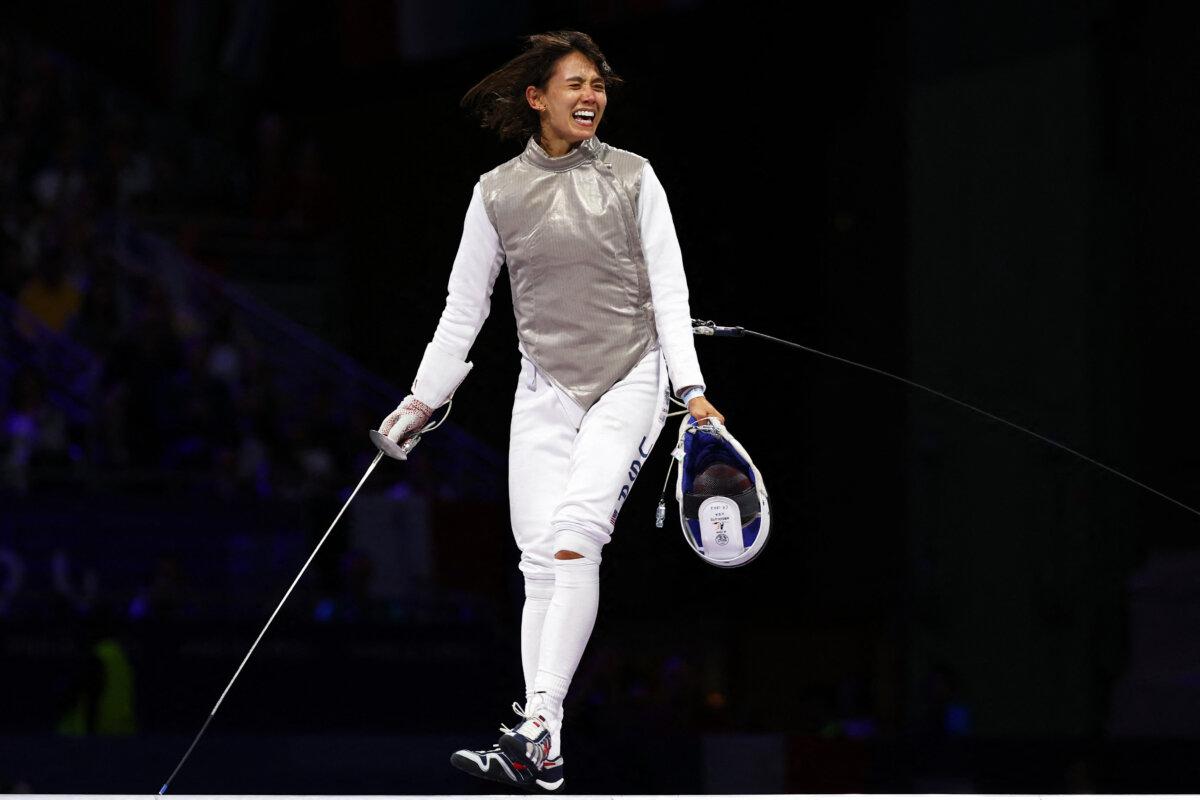 Team USA's Lee Kiefer celebrates after winning against US' Lauren Scruggs in the women's foil individual gold medal bout during the Paris 2024 Olympic Games at the Grand Palais in Paris, on July 28, 2024. (Franck Fife/AFP via Getty Images)