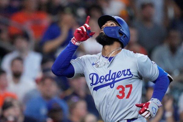Teoscar Hernández of the Dodgers runs the bases after hitting a home run against the Astros in Houston on July 28, 2024. (Kevin M. Cox/AP Photo)