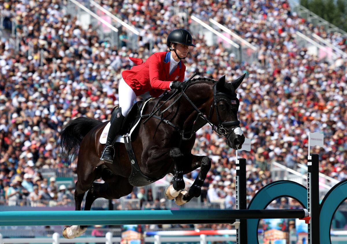 VERSAILLES, FRANCE - JULY 29: Caroline Pamukcu and horse HSH Blake of Team United States compete during the Eventing Jumping Team Final and Individual Qualifier on day three of the Olympic Games Paris 2024 at Chateau de Versailles on July 29, 2024 in Versailles, France. (Photo by Mike Hewitt/Getty Images)