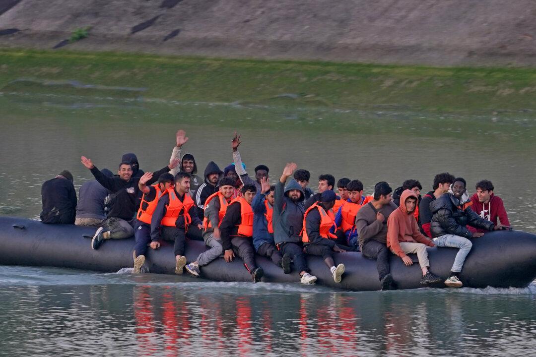 Woman Dies as Migrant Crossings Hit Another Record High