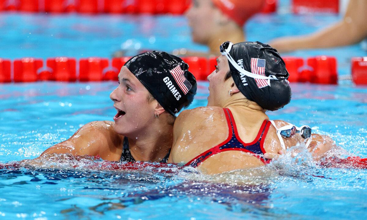 Katie Grimes and Emma Weyant of Team United States celebrate after winning silver and bronze in the Women’s 400m Individual Medley Final on day three of the Olympic Games Paris 2024 at Paris La Defense Arena in Nanterre on July 29, 2024. (Adam Pretty/Getty Images)