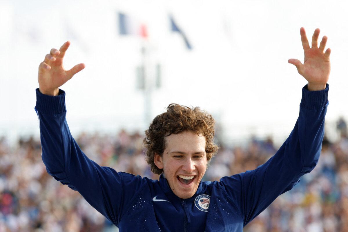 Silver medallist US' Jagger Eaton reacts on the podium during the victory ceremony for the men's street skateboarding event during the Paris 2024 Olympic Games at La Concorde in Paris on July 29, 2024. (Odd Andersen/AFP via Getty Images)