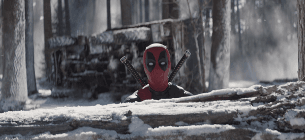 Deadpool (Ryan Reynolds) peering out of Wolverine's<span style="color: #ff0000;"> </span>grave, in "Deadpool & Wolverine." (Jay Maidment/Walt Disney Studios Motion Pictures)