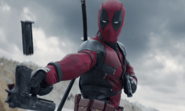 Deadpool (Ryan Reynolds) does a fancy pistol reload, in “Deadpool & Wolverine.” (Walt Disney Studios Motion Pictures)