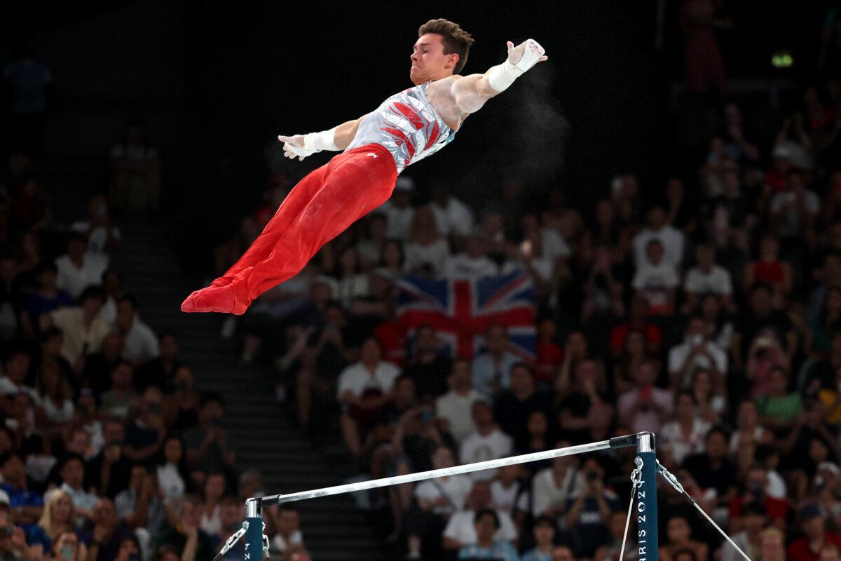 Brody Malone of Team United States competes on the high bar during the Artistic Gymnastics Men's Team Final on day three of the Olympic Games Paris 2024 at Bercy Arena in Paris on July 29, 2024. (Jamie Squire/Getty Images)