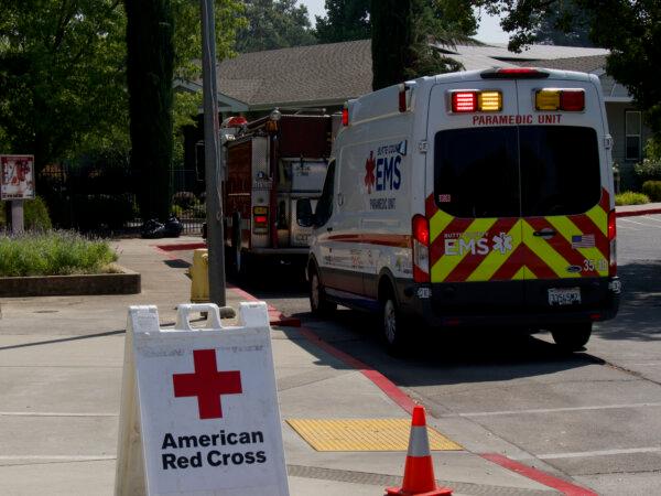 Emergency personnel respond to a medical incident at the Neighborhood Church evacuation center for those displaced by the Park fire in Chico, Calif., on July 29, 2024. (Travis Gillmore/The Epoch Times)