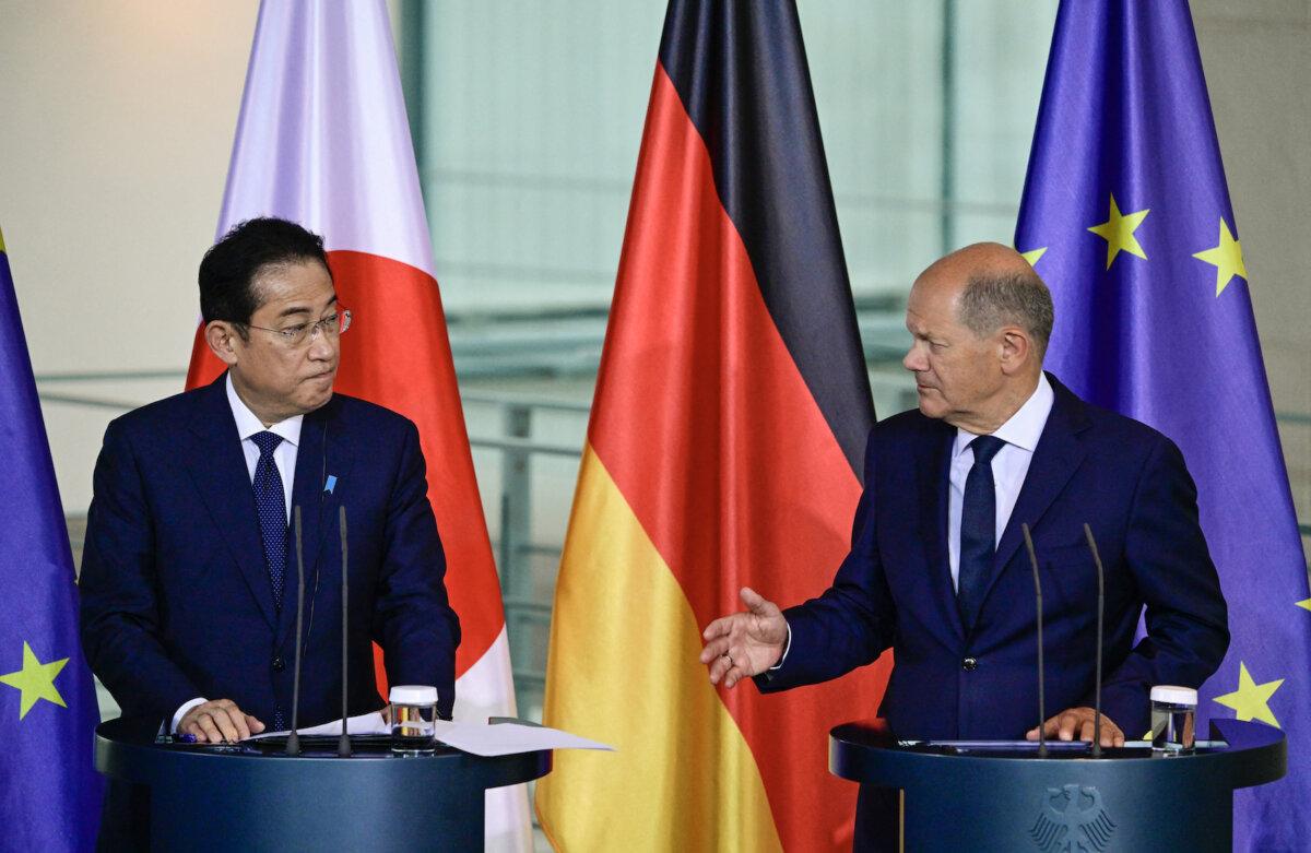 German Chancellor Olaf Scholz (R) and Japanese Prime Minister Fumio Kishida attend a press conference after talks in Berlin, Germany, on July 12, 2024. (Photo by JOHN MACDOUGALL / AFP)